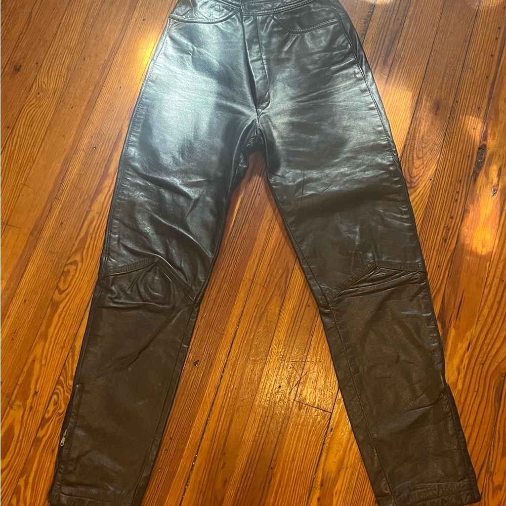 Vintage black leather pants.  Zippers at ankles.  Lined inside to thigh.